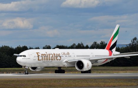 Emirates B773, lineup 19R GM 17 JUL 2019.jpg
